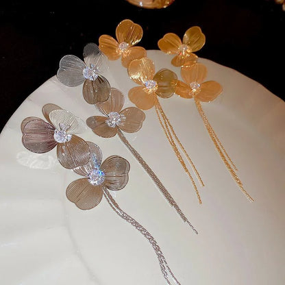 Long metal flower earrings for women, perfect for parties