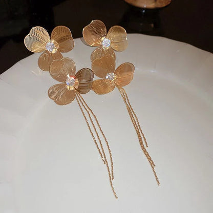 Long metal flower earrings for women, perfect for parties