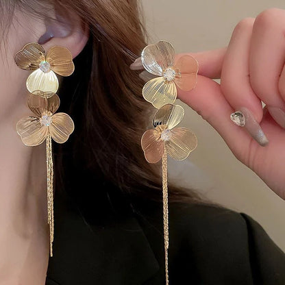 Long metal flower earrings for women, perfect for parties