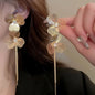 Long metal flower earrings for women, perfect for parties