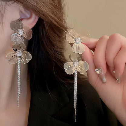 Long metal flower earrings for women, perfect for parties