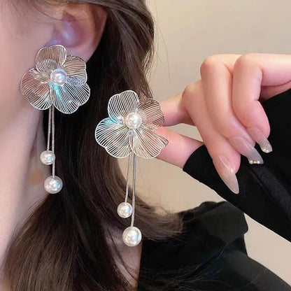 Long metal flower earrings for women, perfect for parties